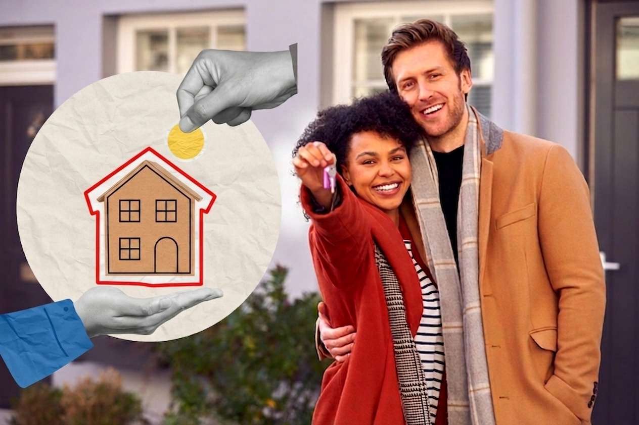 A smiling couple standing outdoors as the woman holds up a set of keys to their new home